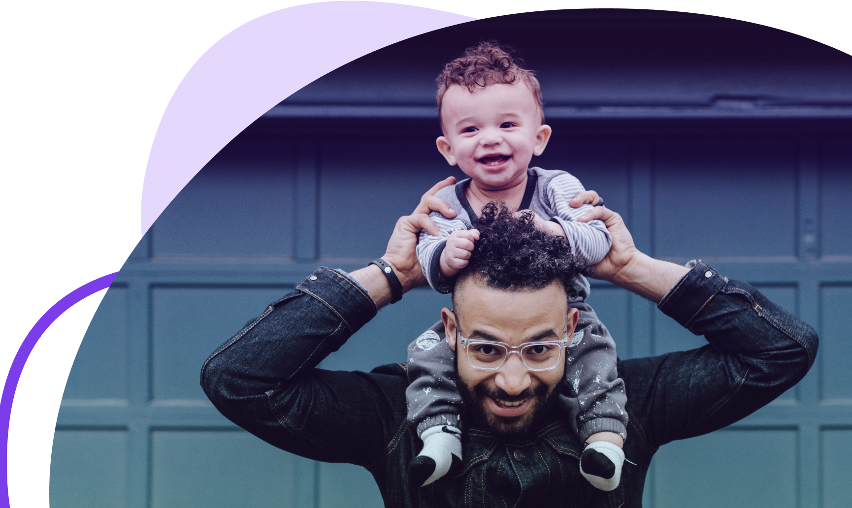 Baby on dad's shoulders