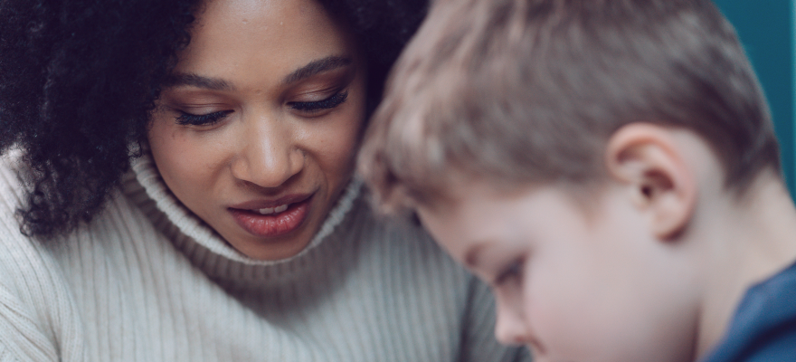 Lady helping child