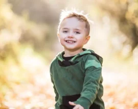 Child running down path