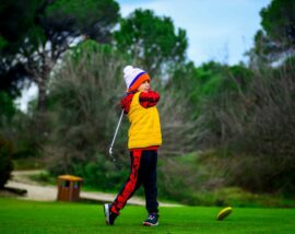 Child playing golf
