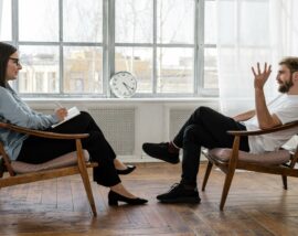 Man and woman talking in appointment
